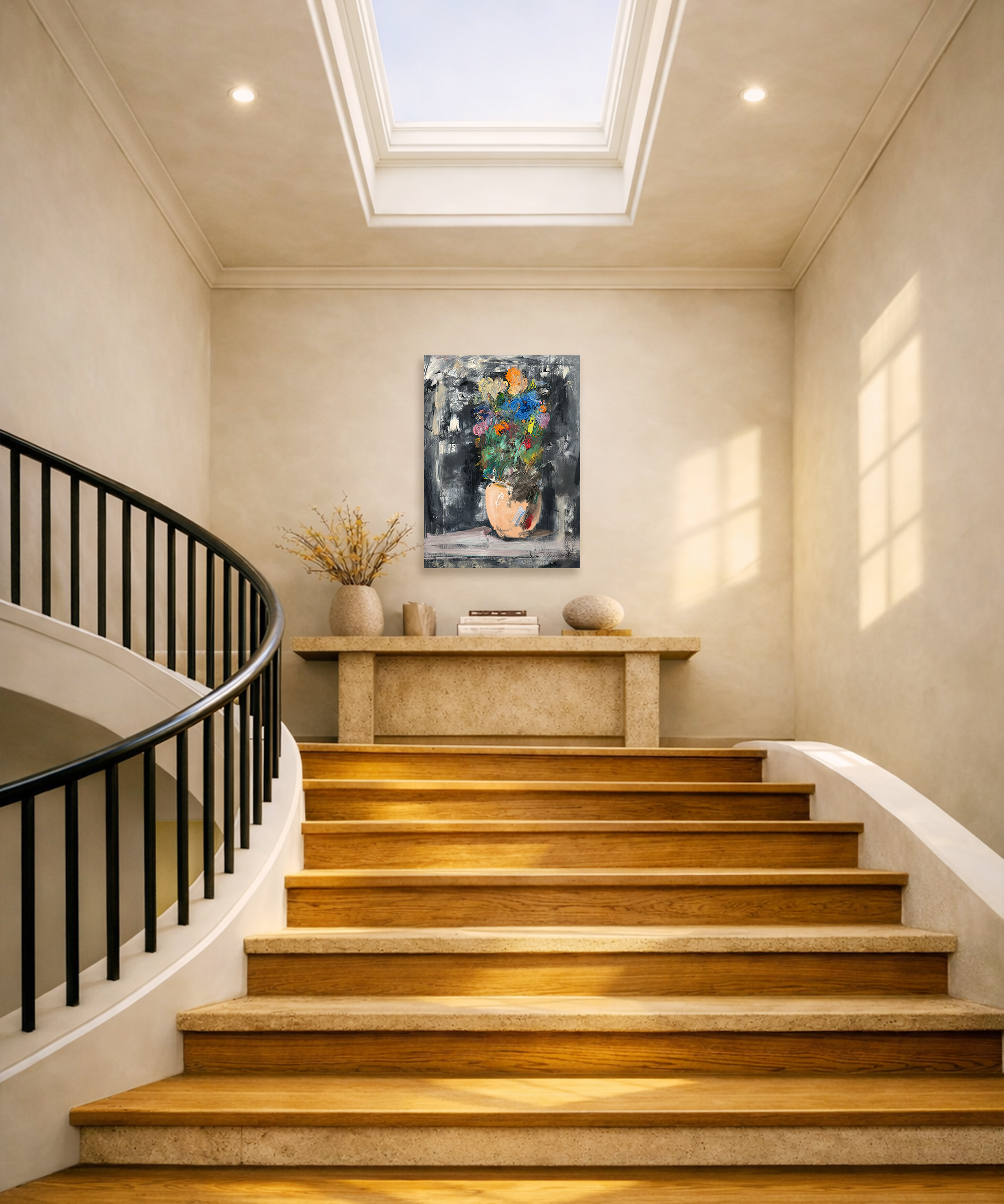 Modern curved staircase with stone console table, sculptural décor, and colorful abstract floral painting lit by skylight.