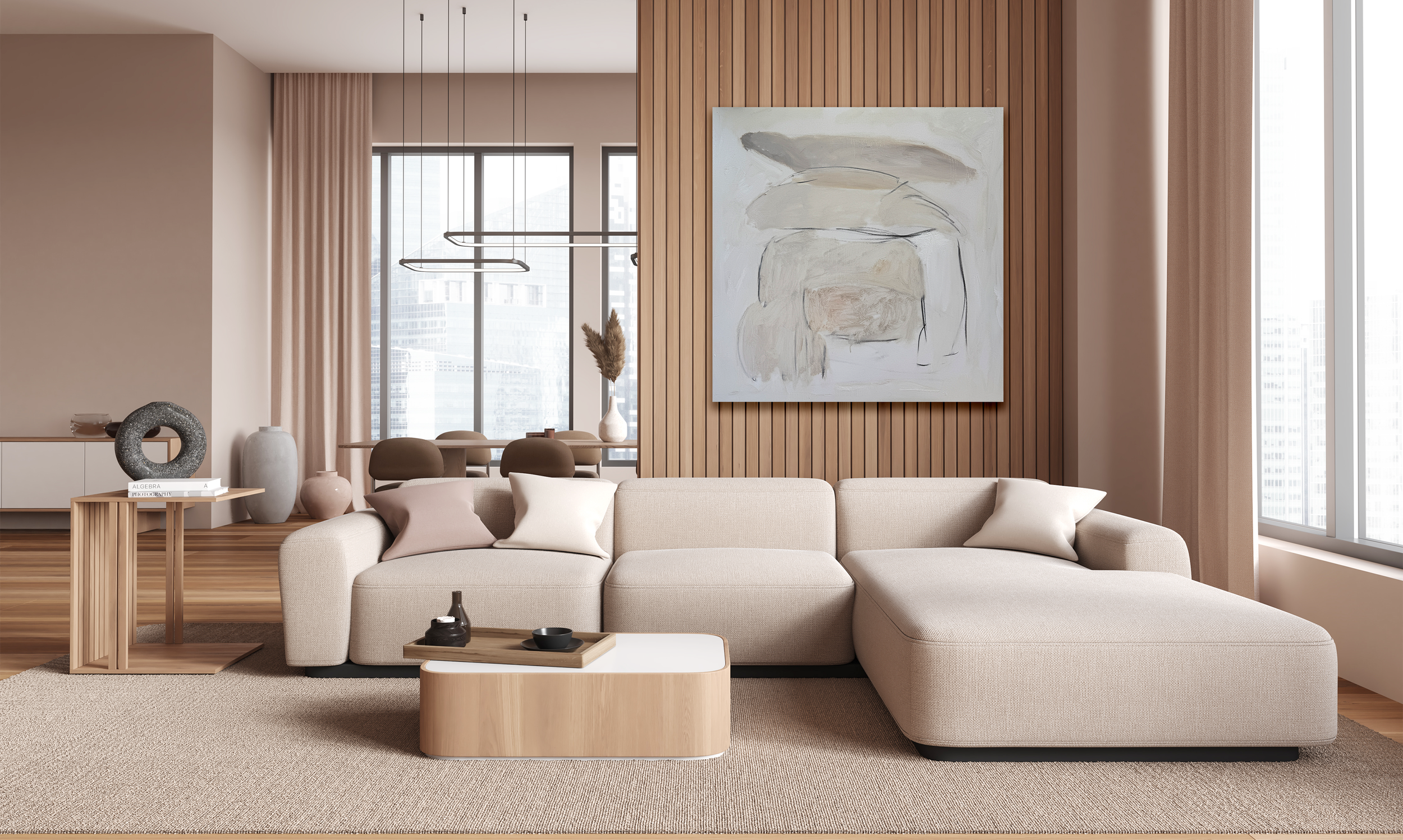 Minimalist living room with beige sectional sofa, wood accent wall, abstract artwork, and natural light.