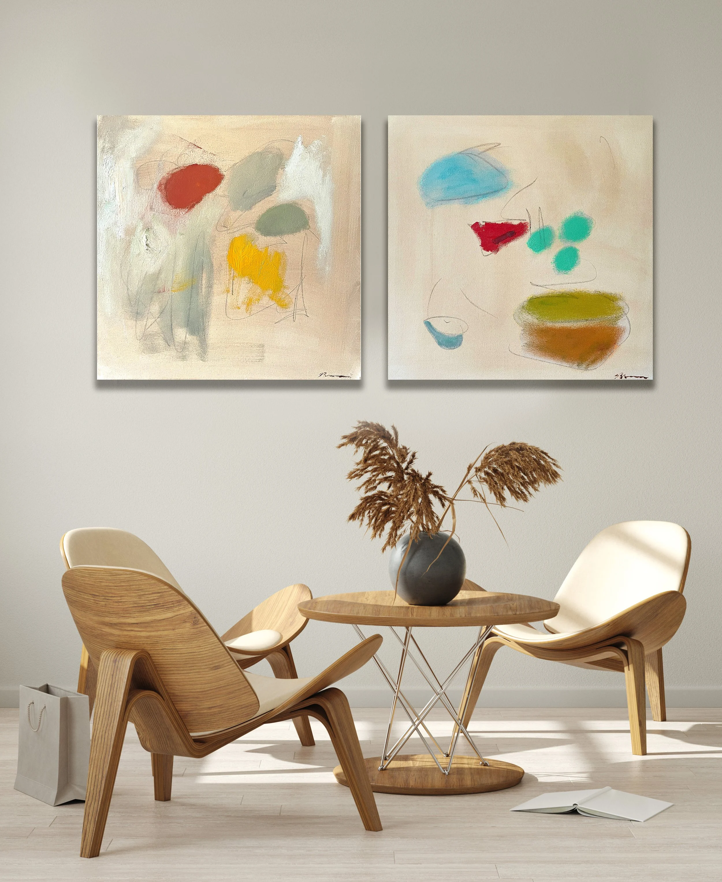 Abstract modern paintings above a minimalist table with vase and wooden chairs.