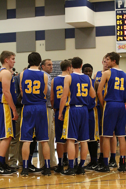 (Photo by Bill Higgins) North Lamar head coach Homer Garner talking to his team against Paris High Saturday night.