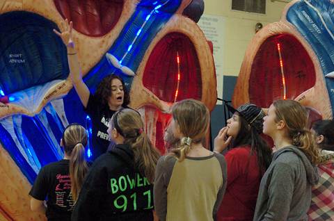 A Paris Cardiology Center team member guides North Lamar 5 th graders through a giant walk-through heart educating them on the heart’s functions and risk factors associated with strokes.