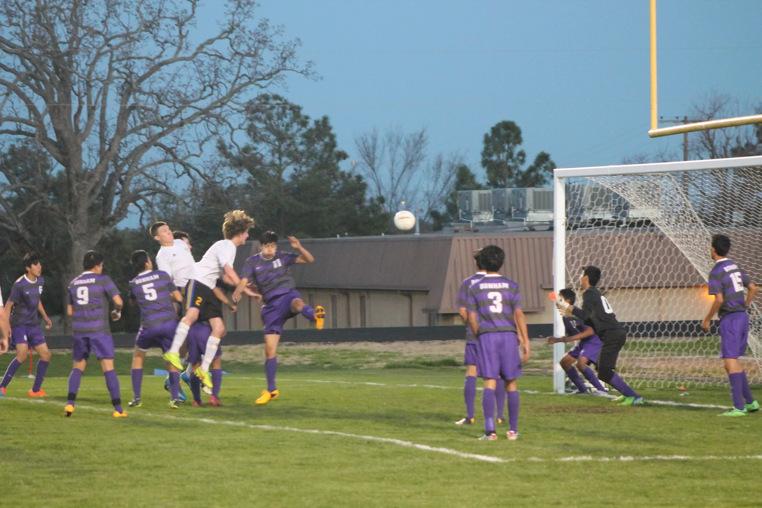 (Photo by Jared Routon) Hunter Loves attempts a header against Bonham