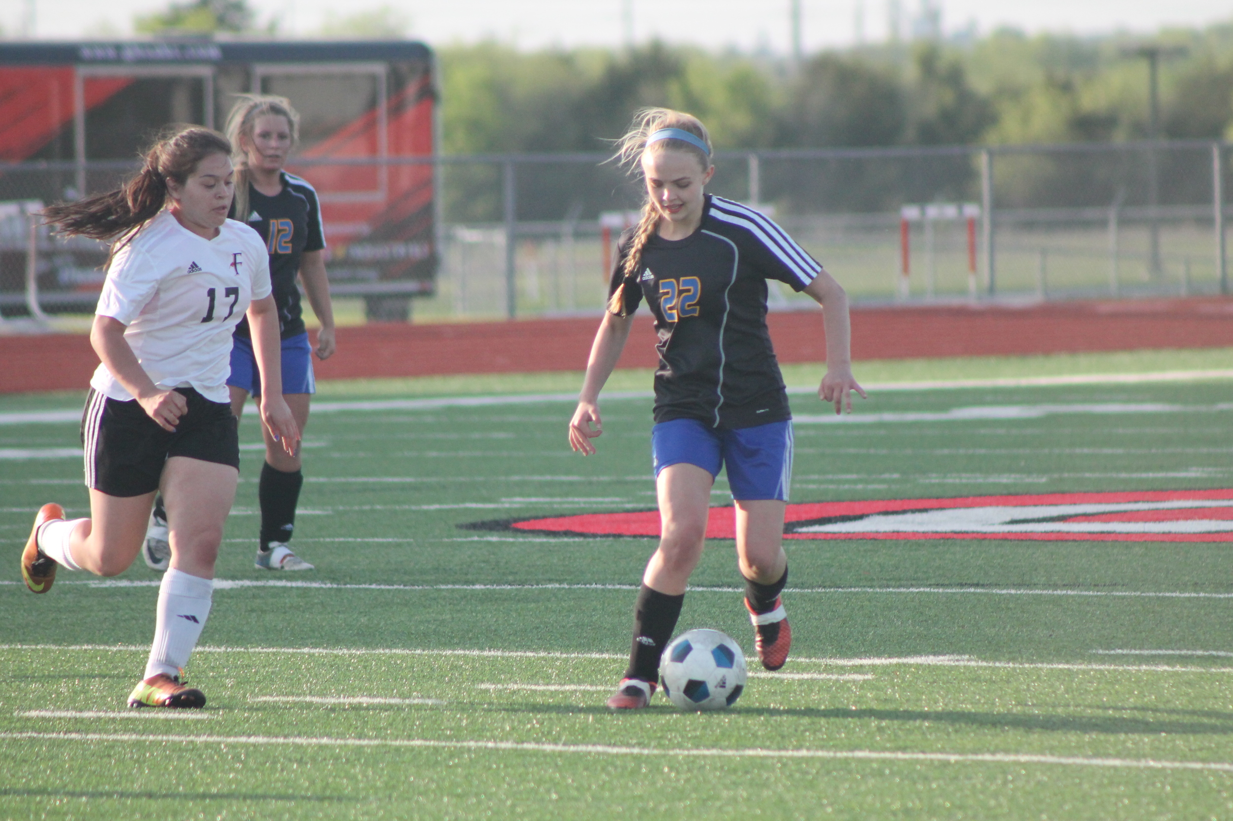 (Photo by Adam Routon) Katie Kilcrease kills another Ferris offensive attempt.