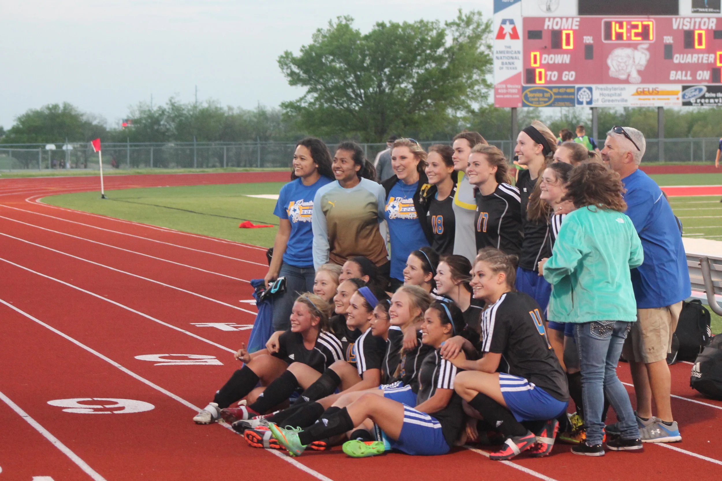 (Photo by Adam Routon) North Lamar posing for pictures after their Area Championship win Friday night.