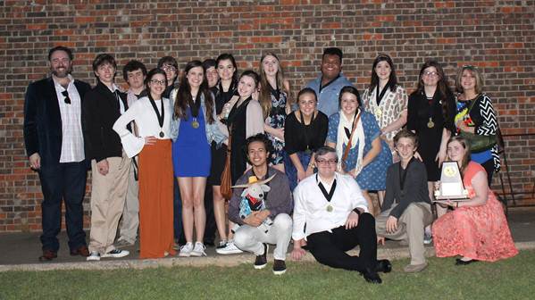 North Lamar’s cast of Twelfth Night gathers after advancing to area. Seated, front row beginning left, are Nic Corpus as Feste, Adrian Hobbs as Malvolio, Cade Shawhart as Officer 2, and Sarah Gentry - Sound Technician. Standing are Director Cody Head, Cameron Beshirs as Andrew Aguecheek, Paul Bayer as The Duke, Kylee Hilliard - Stage Manager, Bradley Chase Allen as Sebastian, Reily Preston as Viola, Brandon Michael as Toby Belch, Autumn Boren as Pirate Antonio, Brittany Birch as Olivia, Anna Holbrook as Captain and Priest, Kallyn Burchinal as Maria, Saveuyon Brown as Valentine and Officer 1, Claire Thompson as Curio, Taylor White as Fabian, Savannah Birdwell - Light Tech, and Laura Hutchings.