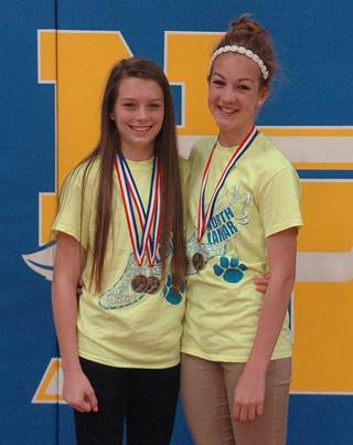 Left, Stone Middle School 8 th grader Keegan Fendley was named District Champion in the 2400m run and the 1600m run while 7 th grader Reyna Hildreth earned District Champion in pole vault.