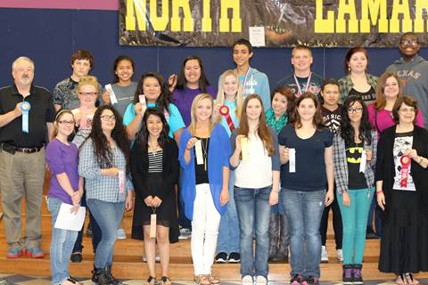 North Lamar High School students brought home ribbons after competing at the NET OLE competition in Commerce. Showing their winning ribbons beginning front row left are Elizabeth Gilbert, Abigail Blodgett, Lilliana Arroyo, Jessica Driggers, Bayleigh Jordan, Heather Armstrong, Megan Grogan, and sponsor Alison Hayter; middle row, sponsor William St. John, Shelby Beaty, Rosa Chavez, Amber White, Faviola Tinoco, Topanga Mossiah, and Chloe Whisenhunt; and back row, Skylor Justice, Michelle Chavez, Leslie Cortez, Alex Ramirez, Kevin Dawson, Kay Edwards, and Jordan Walters. Not shown are Luke Fowler, Jaxon Hevron, Skylor Justice, Korbin Hamner, and Merilyn Campbell.