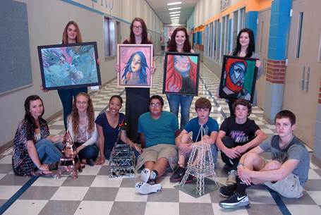 North Lamar High School artists who placed in the Paris Art Fair beginning front row left are Shelby Spears, Hailey Stidham, Kadaja McPeters, Steven Wisham- Peregrina, Rhett Cody, Zeke Wood, and Jeremiah Guenther. In back are Carly McCurry-Porter, Lauren Arnold, Gracie Mullens, and Shalen Haney.