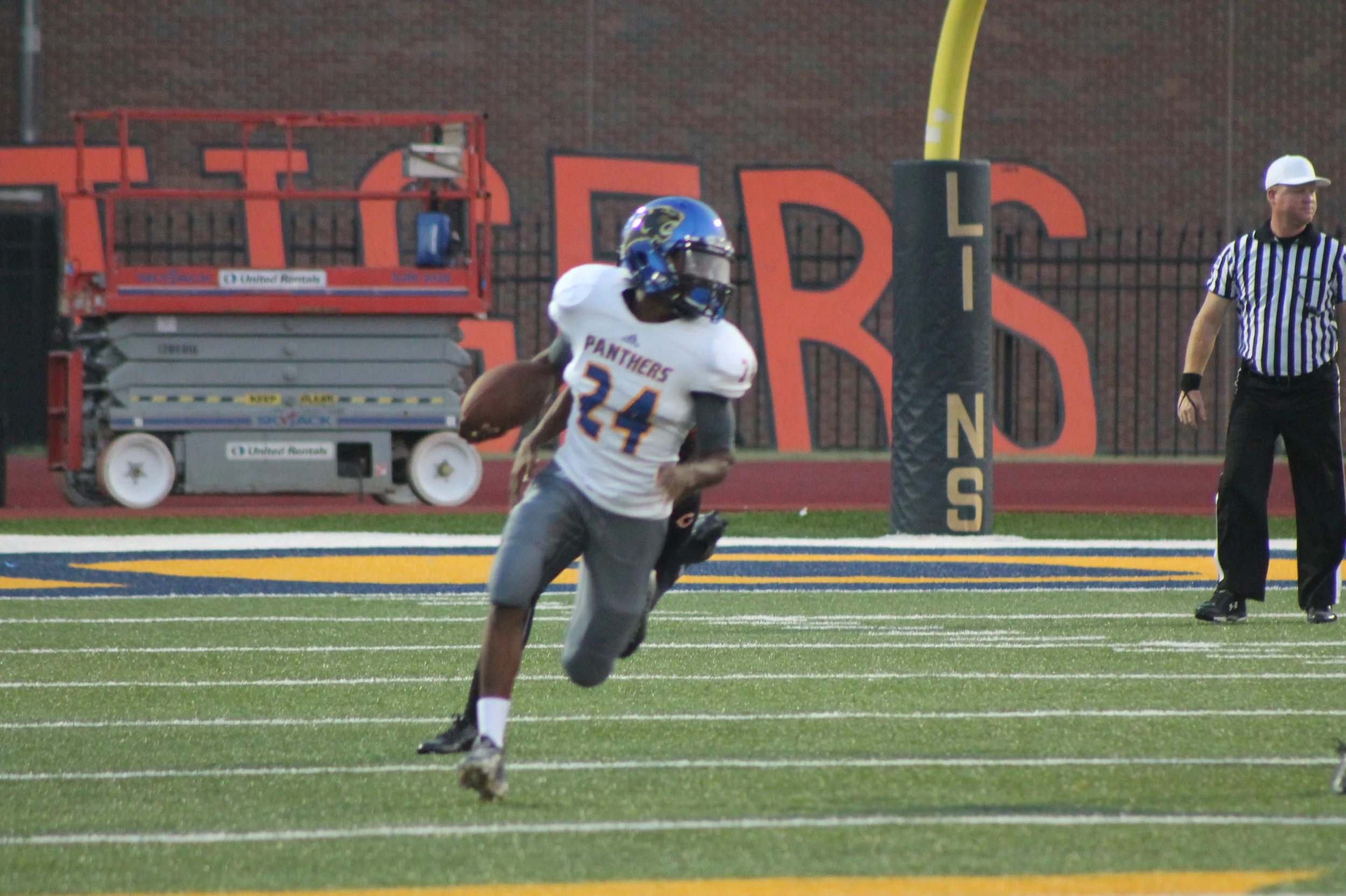 (Photo by Maddy Routon) Javon Franklin breaking free on an 80 yard touchdown pass play.