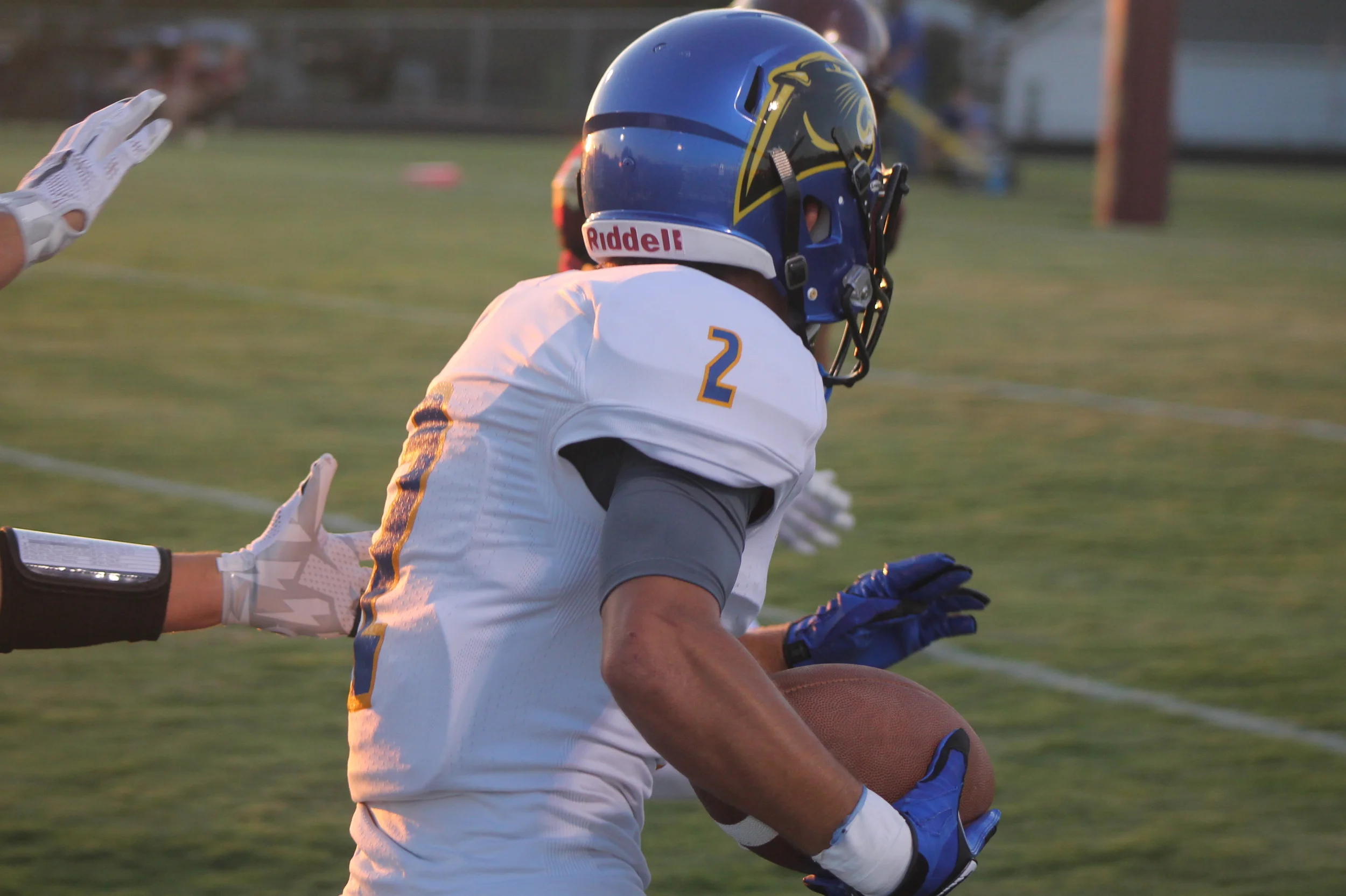 (Photo by Adam Routon) Sam Cowling with a Touchdown run after catching a pass from Versache Buchanan. 