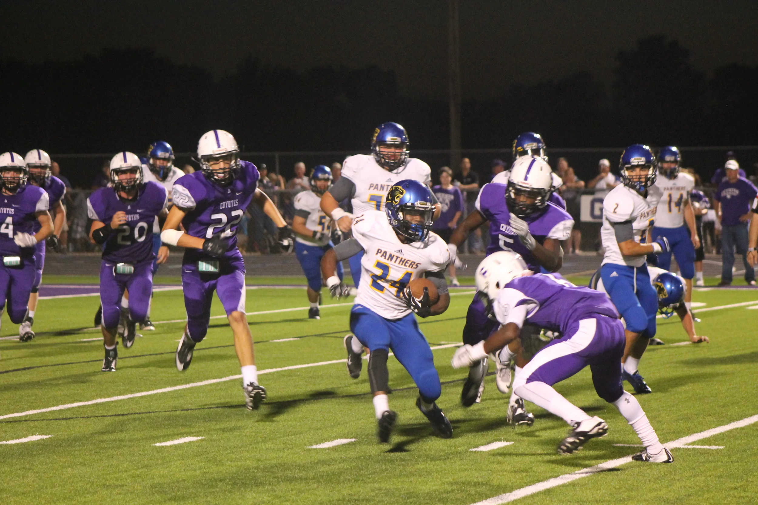 (Photo by Maddy Routon) Javon Franklin avoiding a defender Friday night in Anna