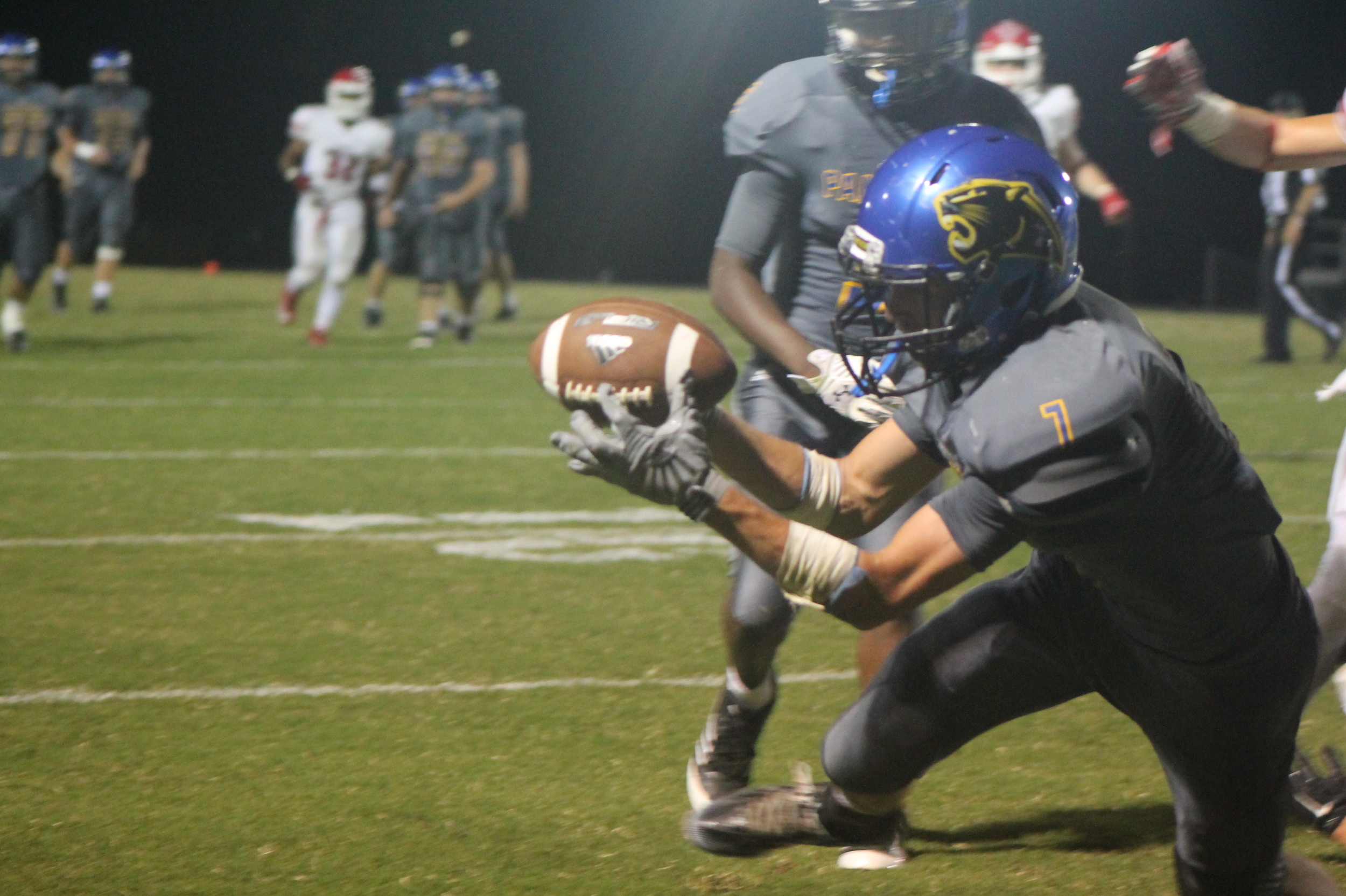 (Photo by Maddy Routon) Trey Scudder with a touchdown reception for North Lamar against Van.