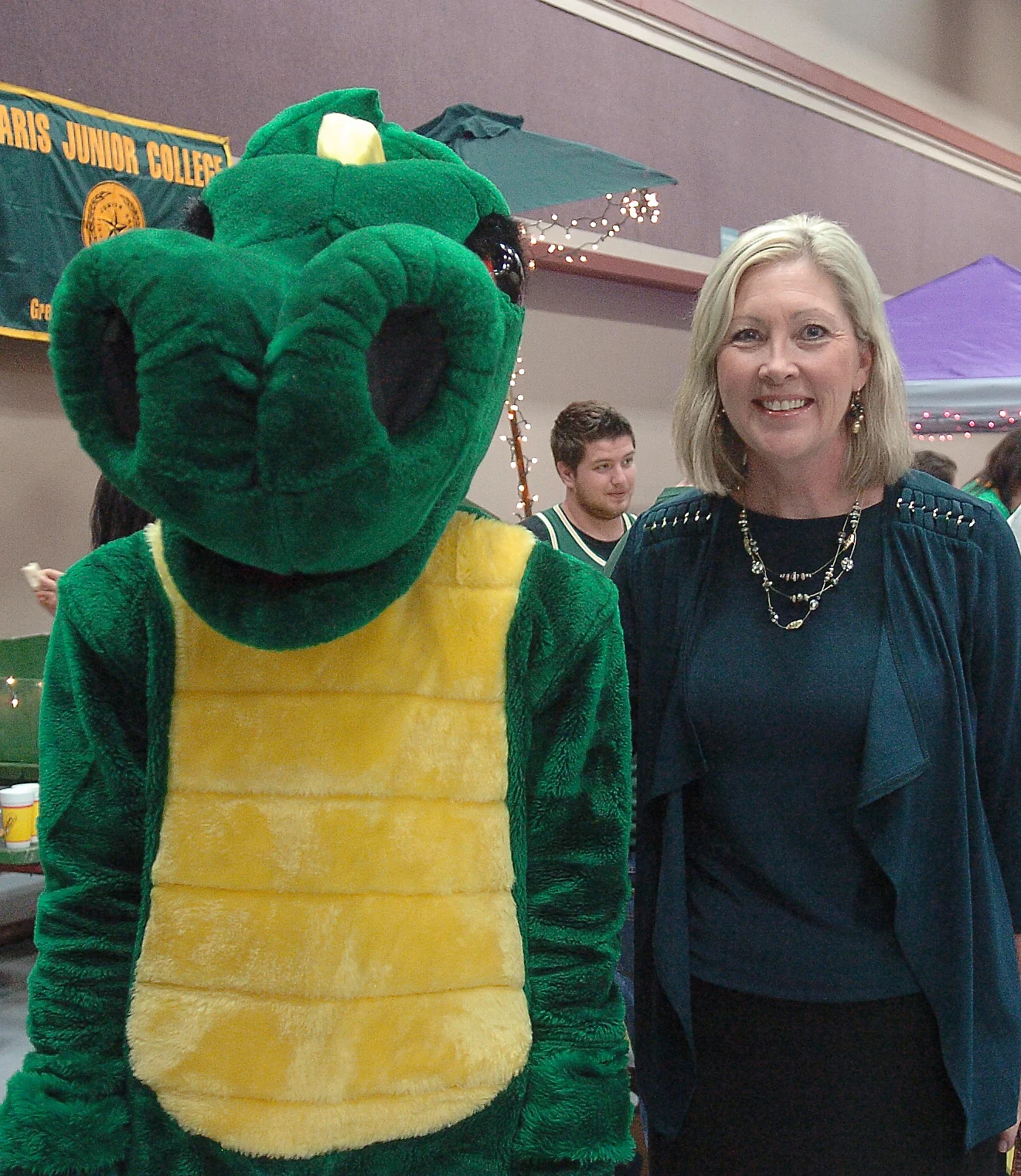 Paris Junior College President Dr. Pamela Anglin, right, accompanied Pyro at the 2014 NLEF Tailgate Scholarship event.