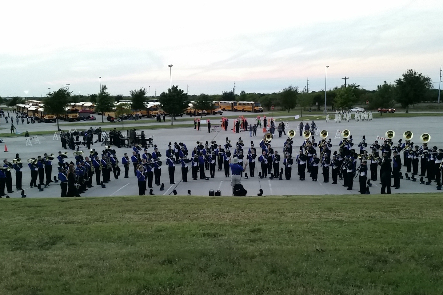 The North Lamar Marching Band warms up in a parking lot before competing in the U.S. Bands Competition in Denton on October 3