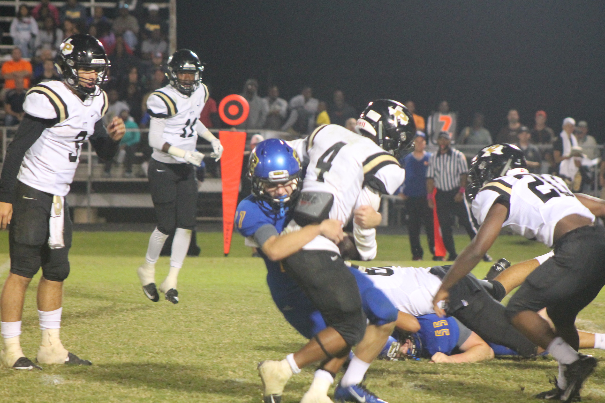 (Photo by Adam Routon) Jeremiah Guenther making a tackle Friday night.