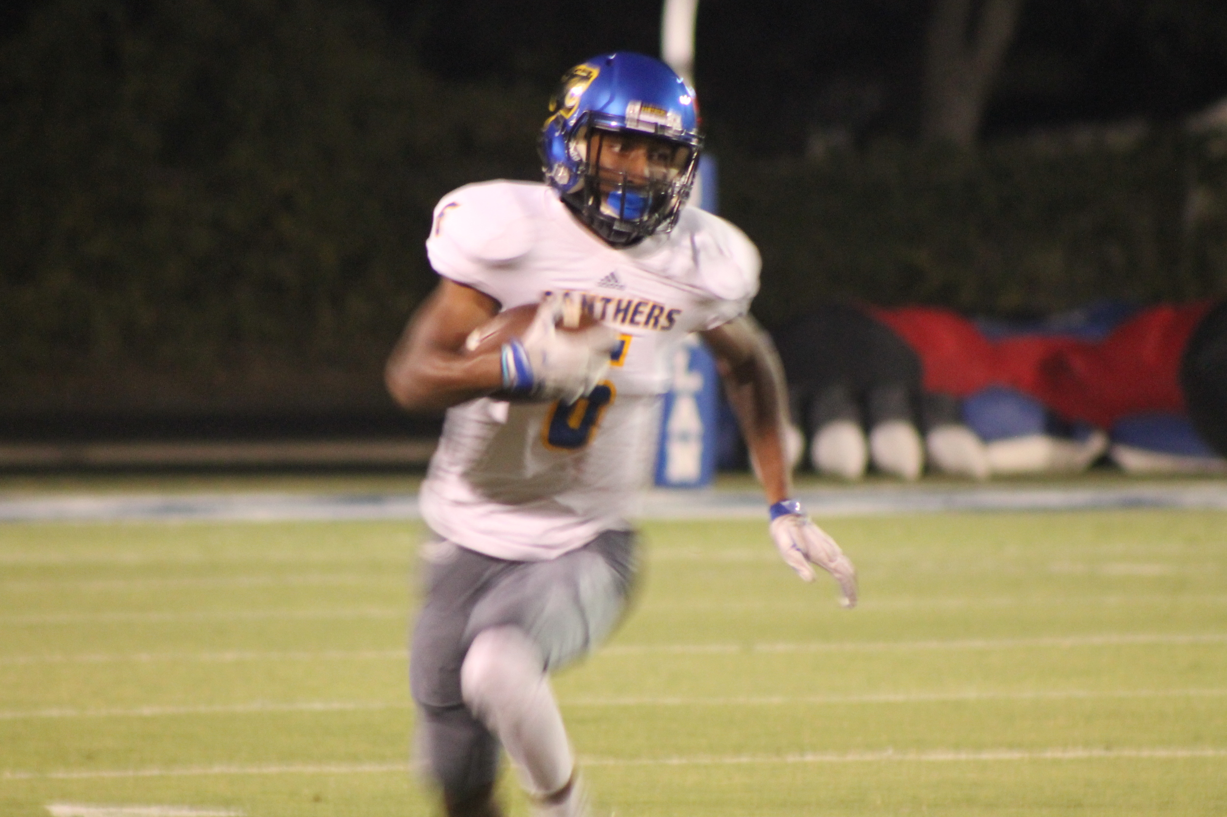 (Photo by Maddy Routon) Julique Franklin running the opening kickoff back 62 yards for a touchdown.