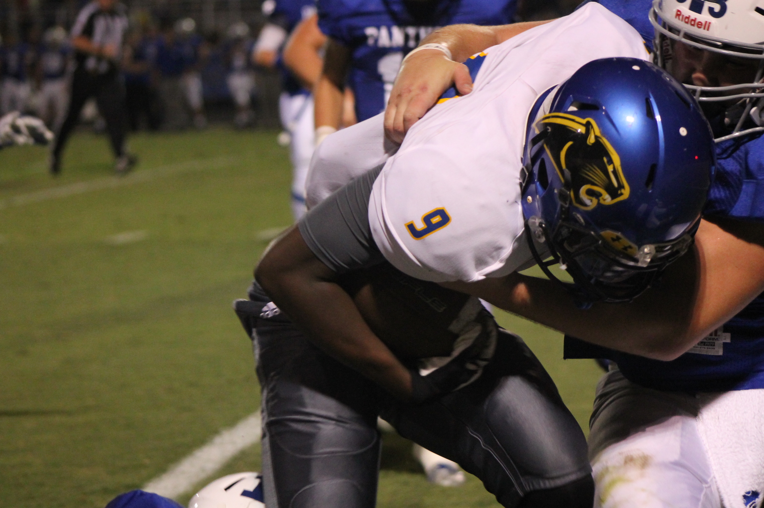 (Photo by Maddy Routon) Menderiz Gray fighting for more yards Friday night.