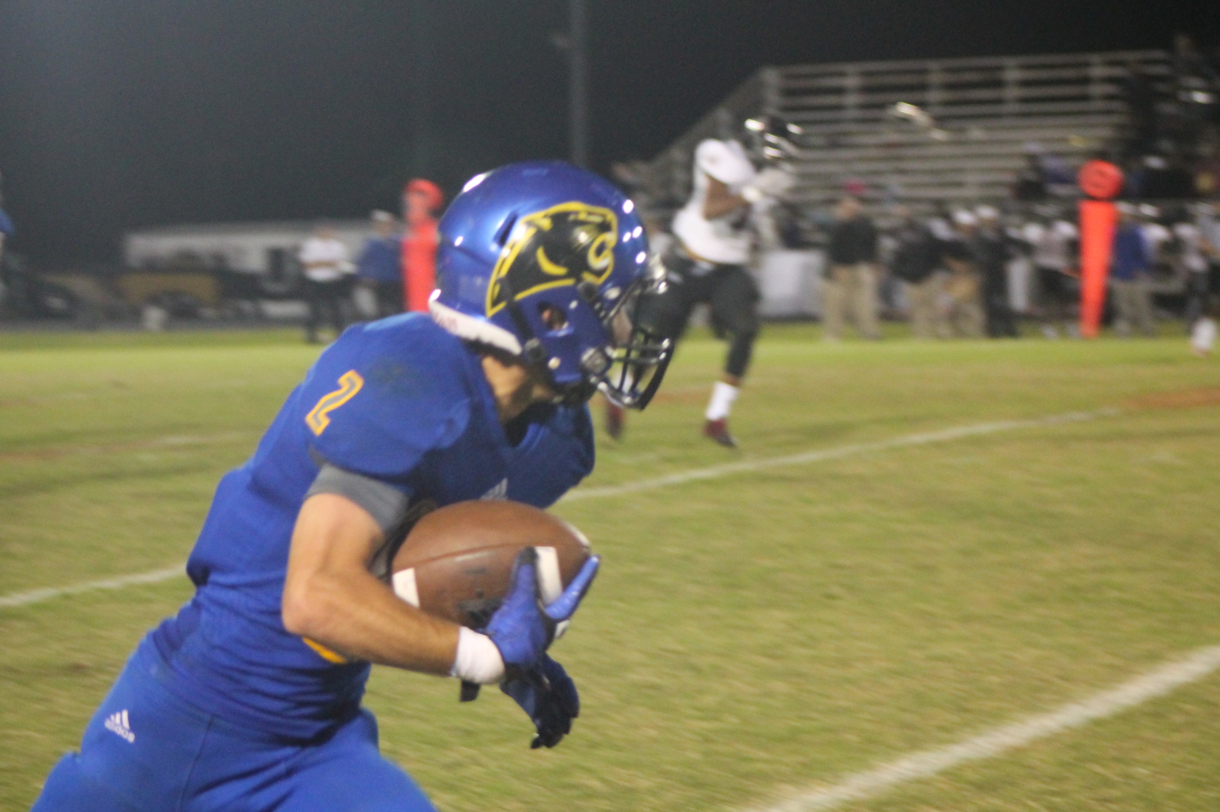 (Photo by Adam Routon) Sam Cowling with a reception and touchdown against LE Thursday night.