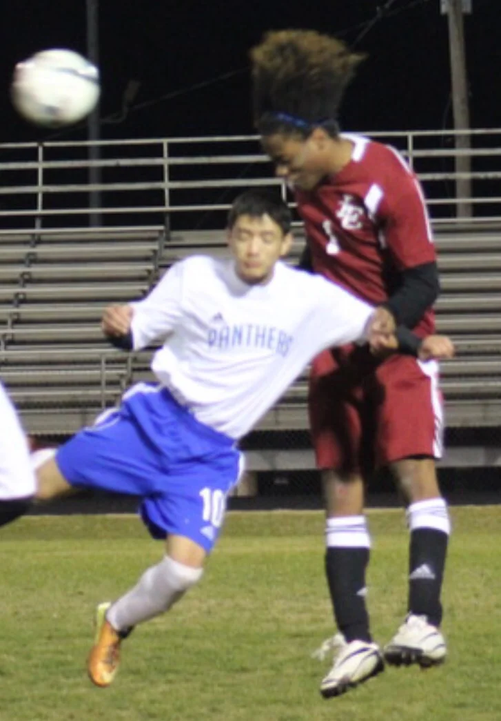 Kshatiz Basnet contends for a header (photo by Madison Routon)