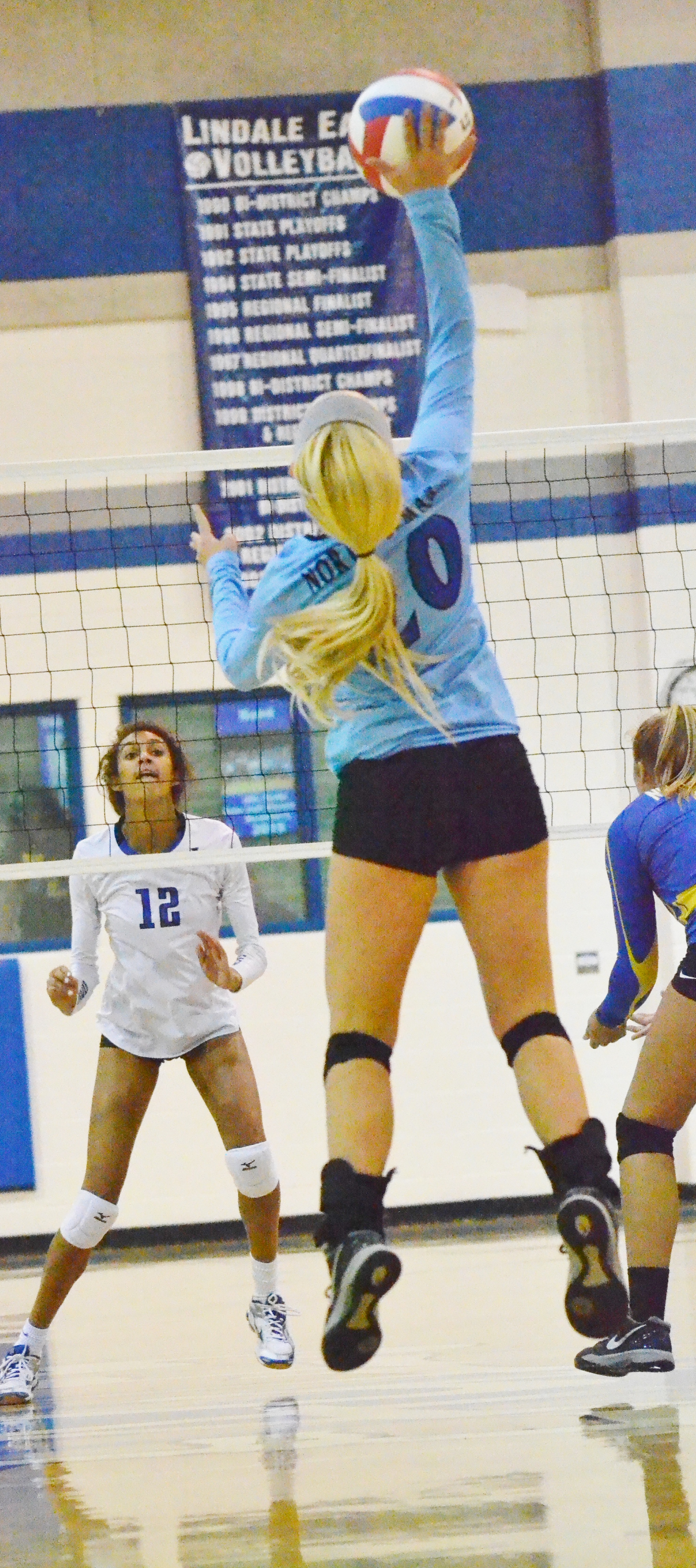 (Photo by Beverly White) Natalie Allen hitting the ball for North Lamar
