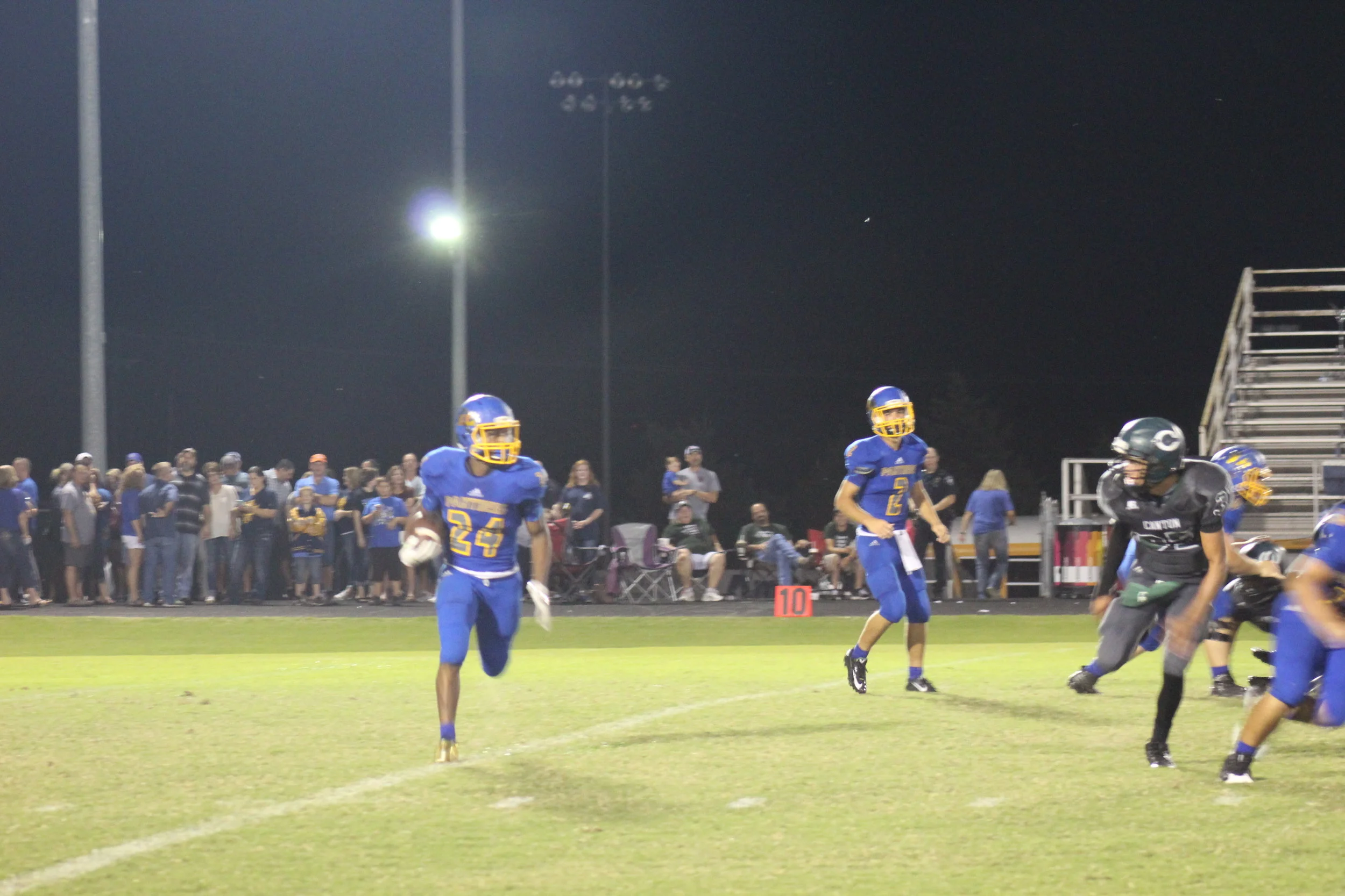 (Photo by Aaron Routon) Javon Franklin with a rush against Canton