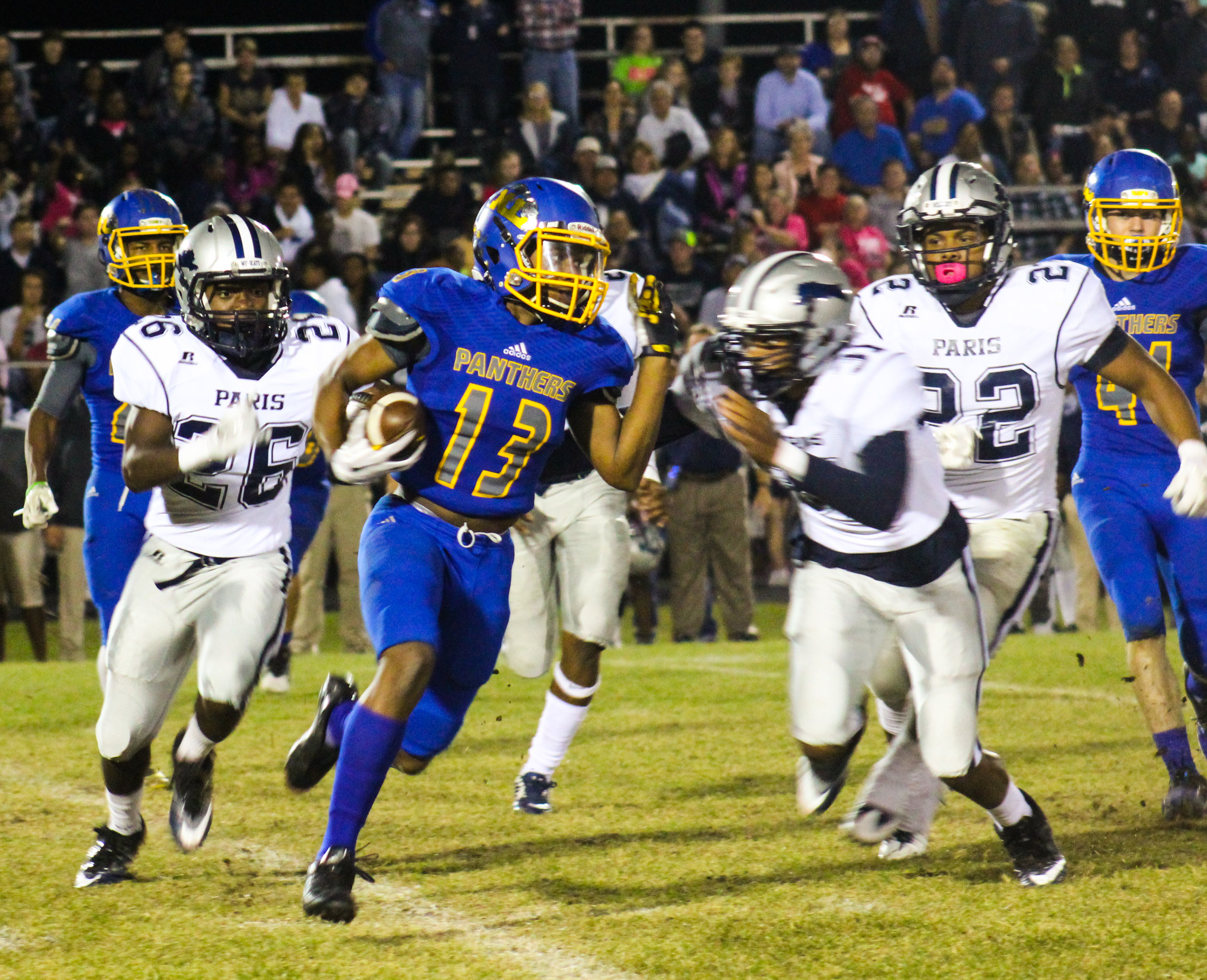 (Photo by Adam Routon) Seybian Holt (13) with a kickoff return for North Lamar