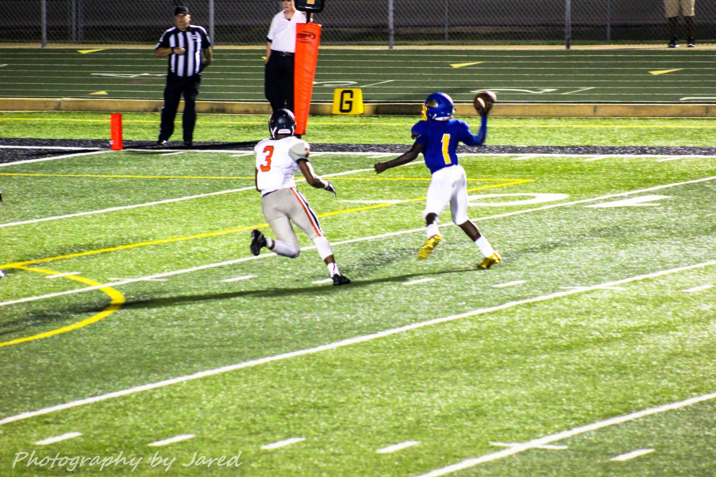 (photo by Jared Routon) Jay Walters with a pass for a two-point conversion against Leander Glenn.