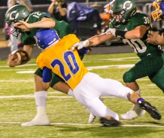Jackson Leonard with a tackle --photo by Lynn Englis
