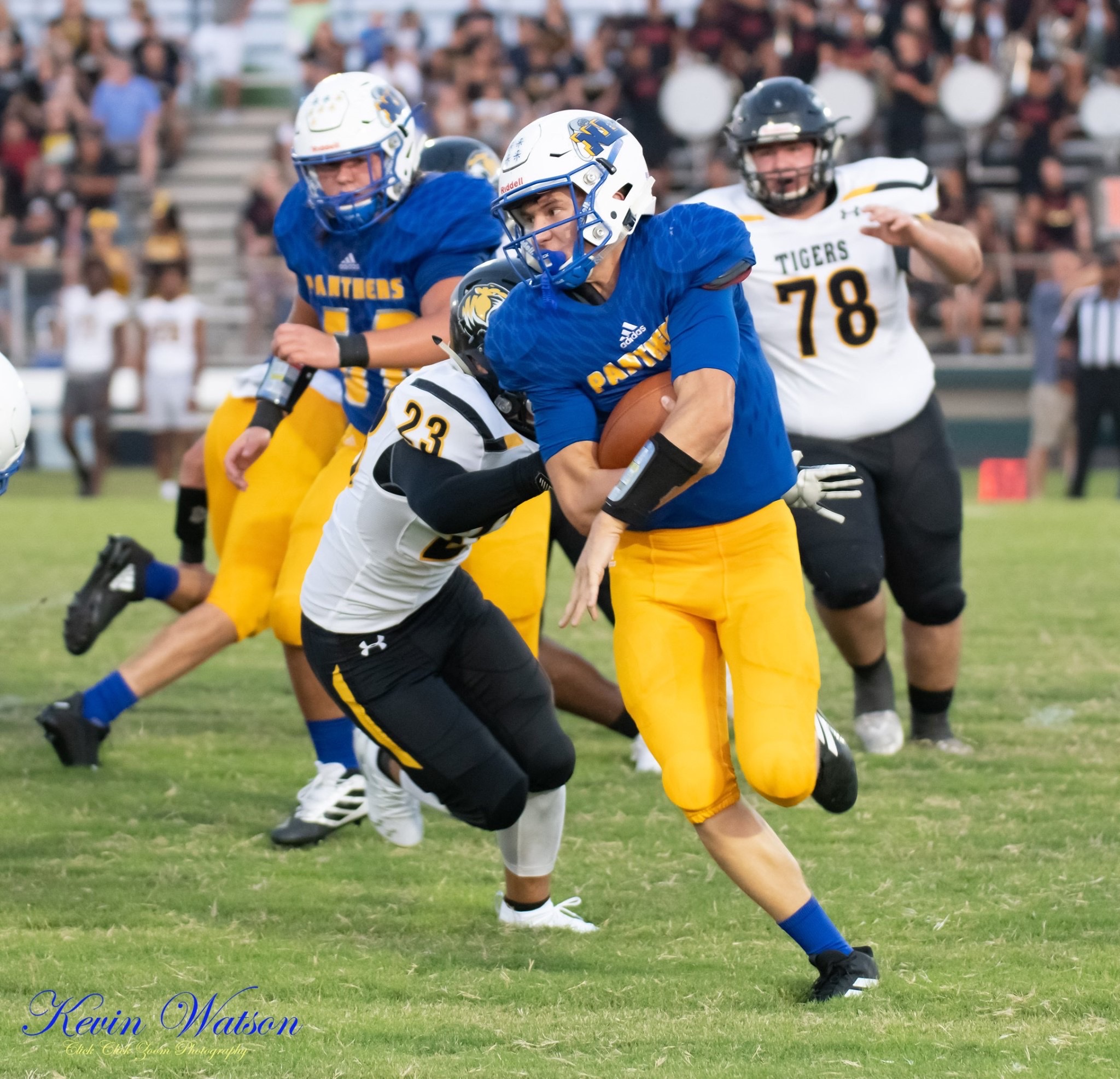 (Photo by Kevin Watson): Seth Parker with a ball carry on Friday against Mt. Pleasant.