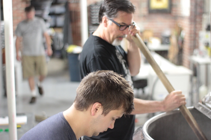 Scott stirring the the grain during mashing in.
