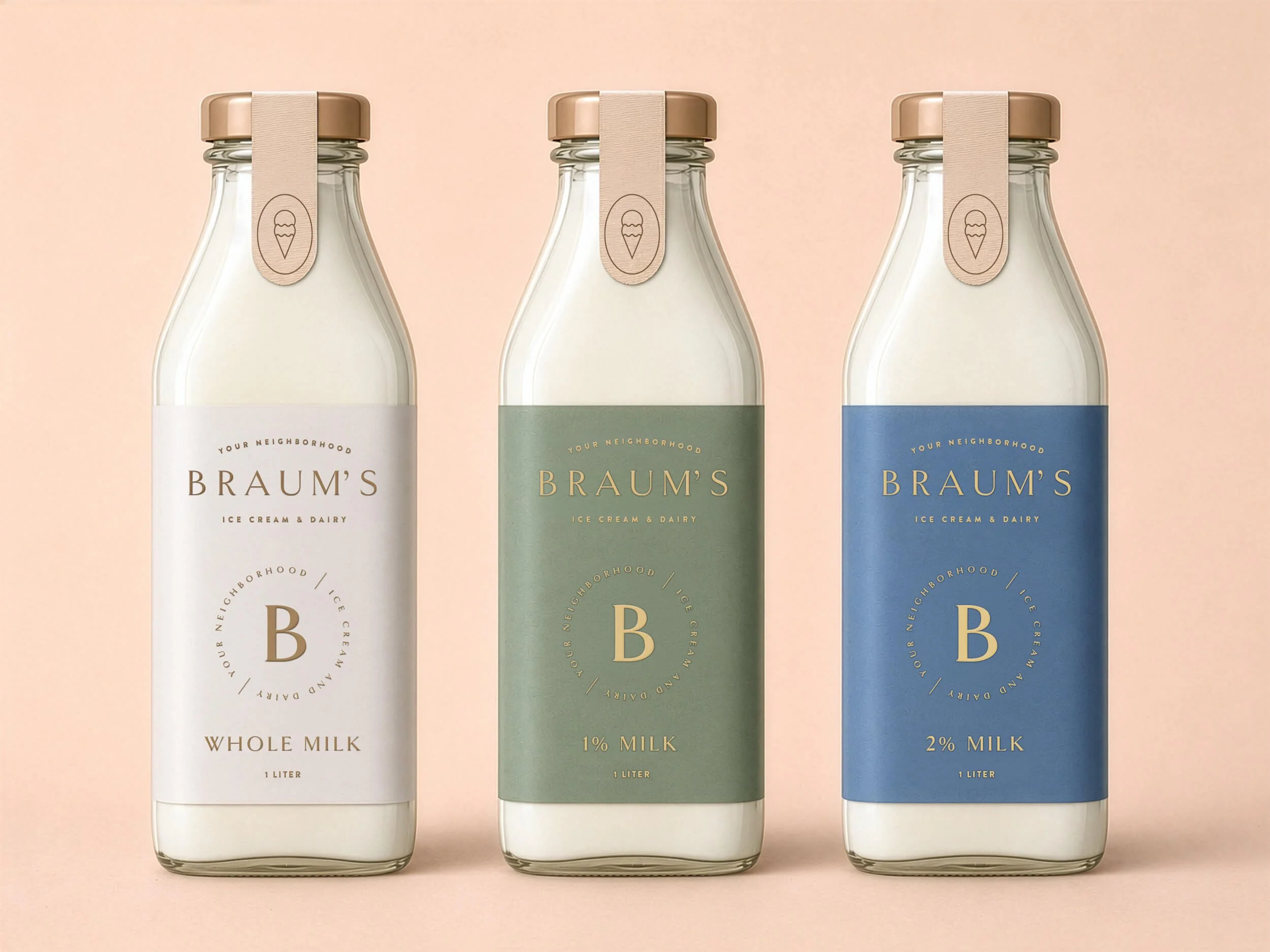 Concept of 3 glass bottles of Braum's milk displayed side by side, featuring white, sage green, and blue labels for whole milk, 1% milk, and 2% milk. Each bottle has a tan cap and a matching neck tag with an ice cream cone icon.