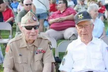 WWII Veterans honored prior to flag placement on the field.