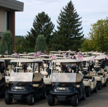  Golf carts decked with American Flags . . . . .ready to go!! 