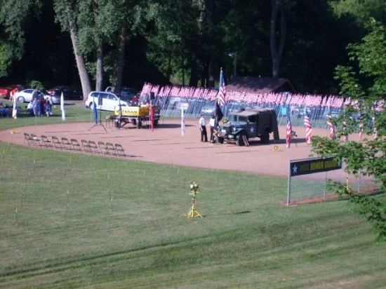 Mazeppa Veterans Honor Guard preparing for the Field of Flags Program.JPG