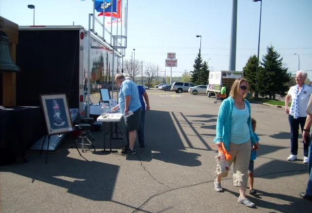 Home Depot customers visiting Bell of Honor
