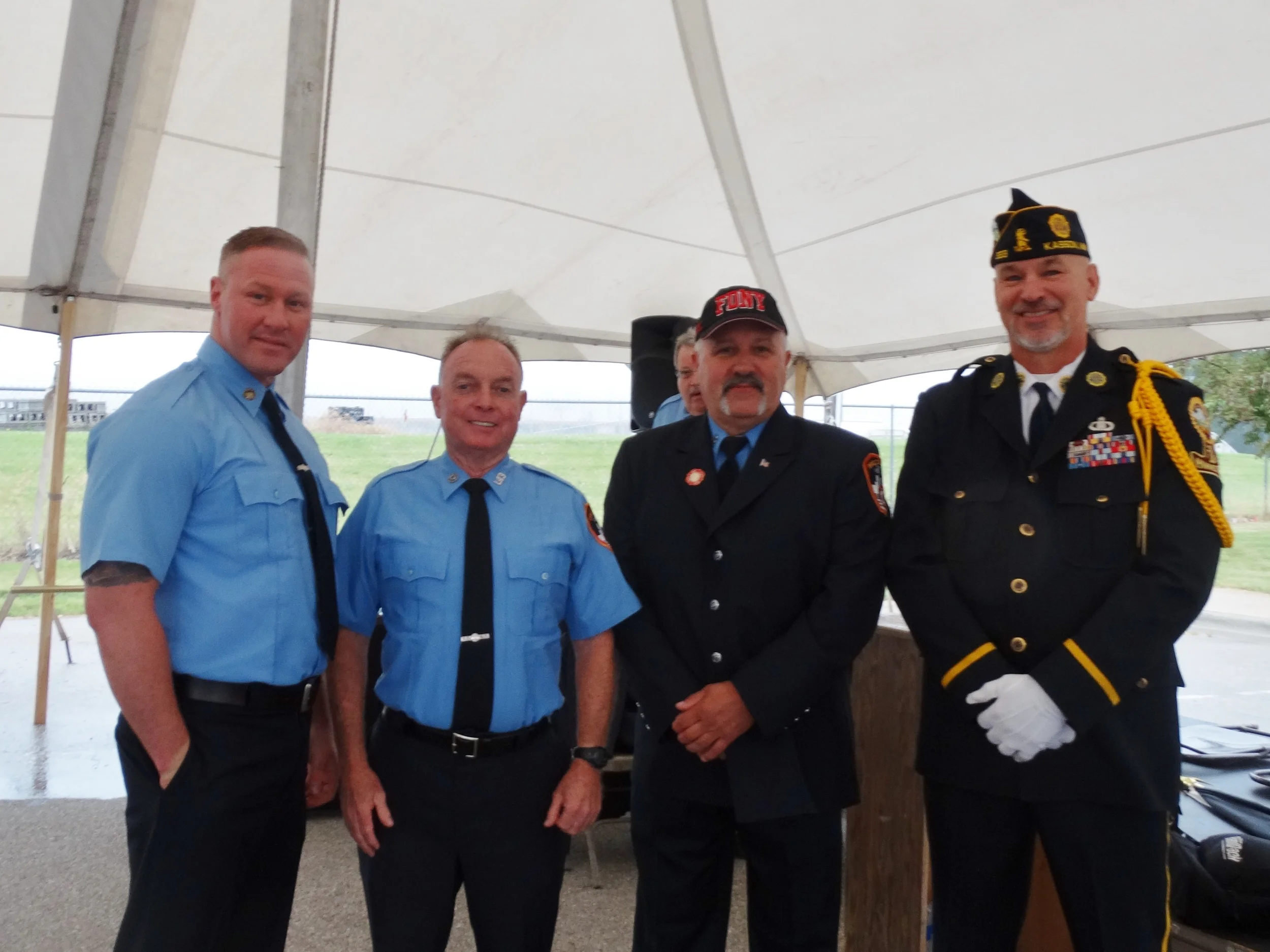 Todd Nelson Dodge County Veterans Affairs (r) with 3 of the NY Fire Fighters