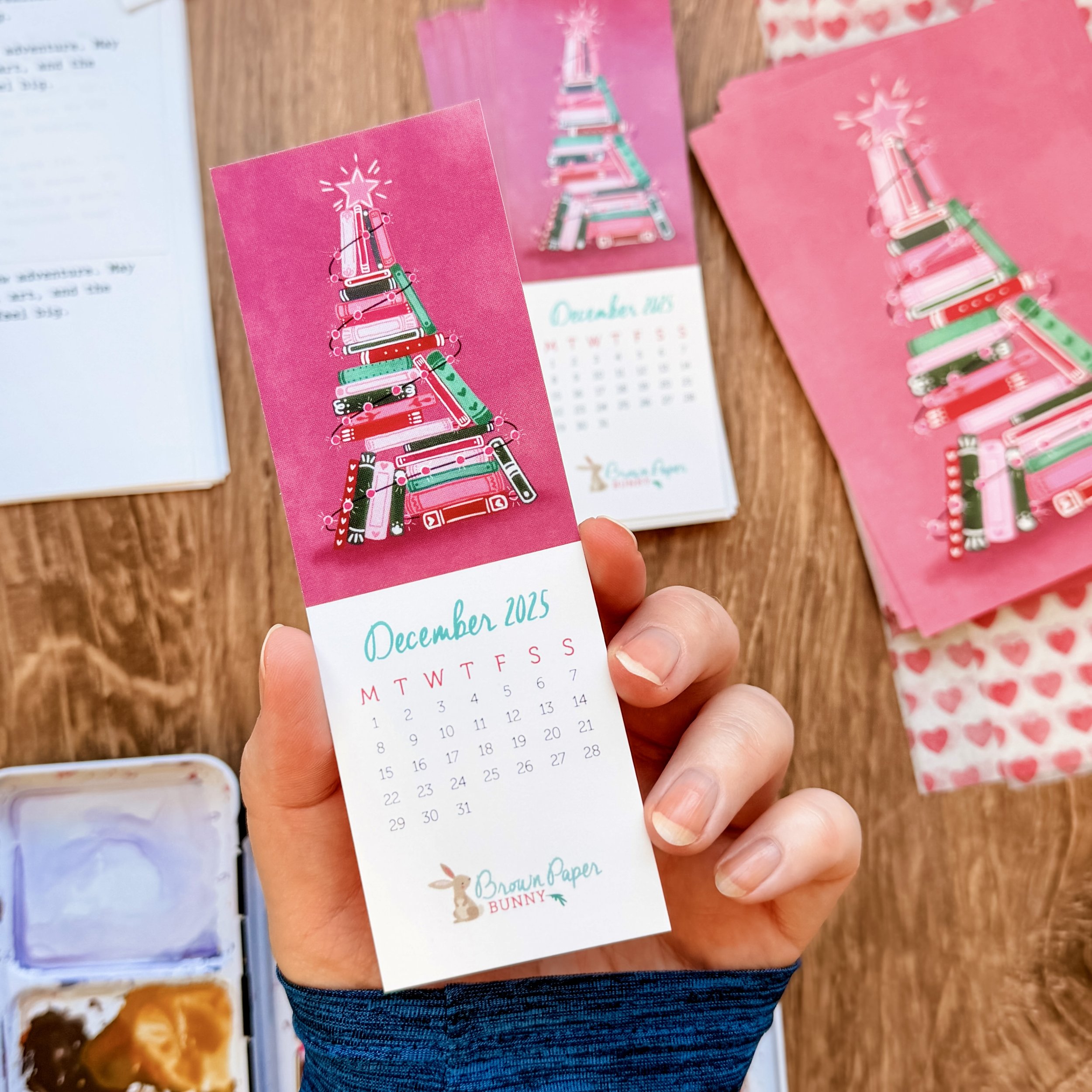 December Hoppy Mail bookmark with painted pink book tree