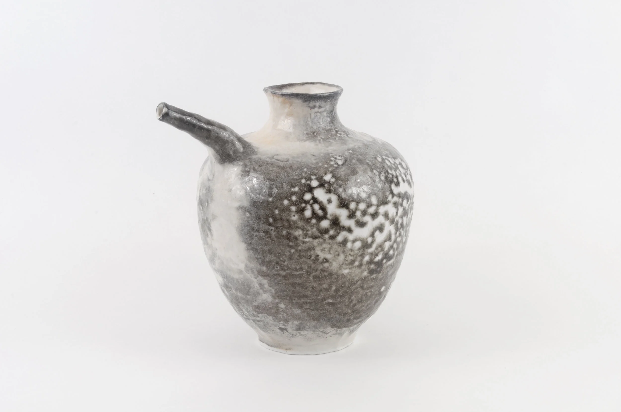 Spouted bottle Porcelain and shino glaze, 2018