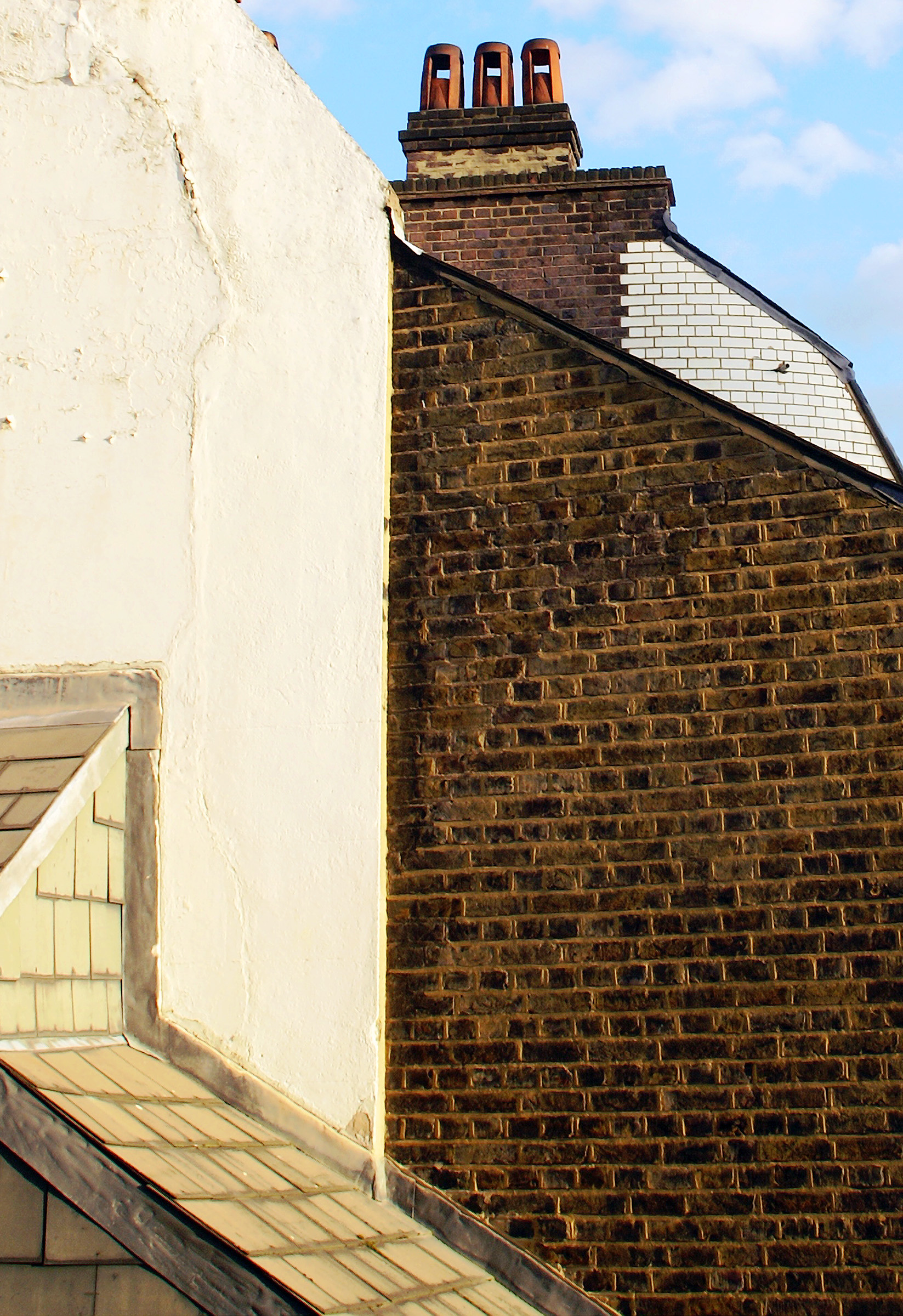 London brick and shingle walls windowless.jpg