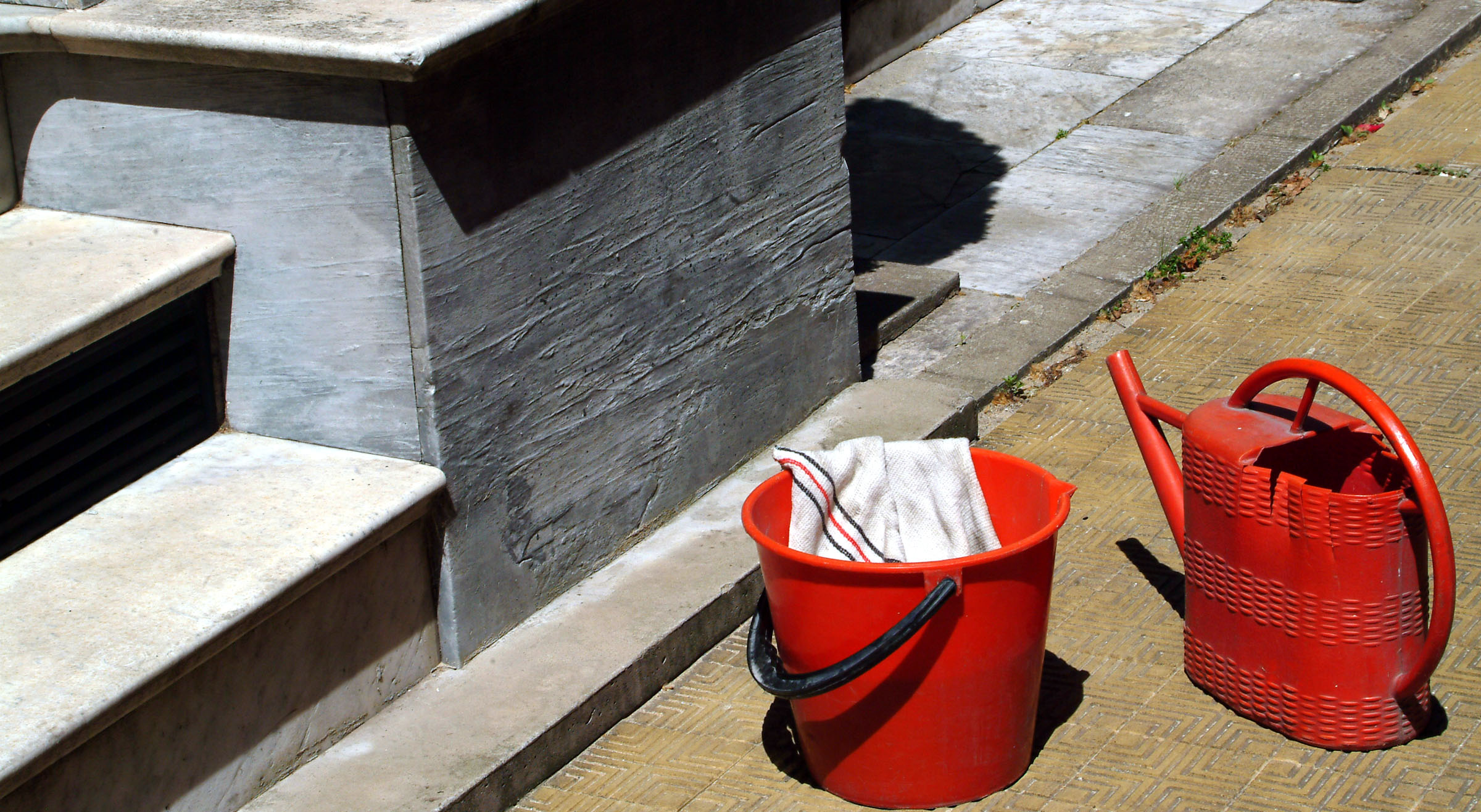 red bucket and watering can.jpg