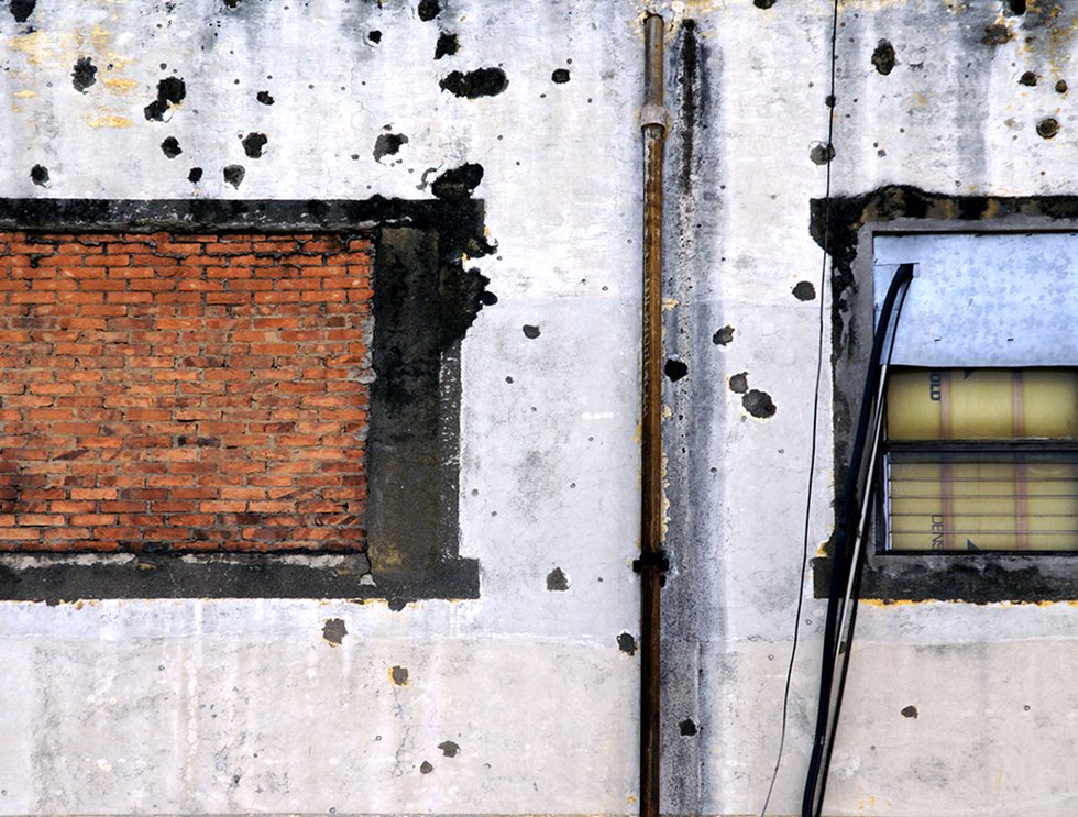 OPTICS WS 01 x cr  5 7 San Jose pockmarked wall w windows.jpg