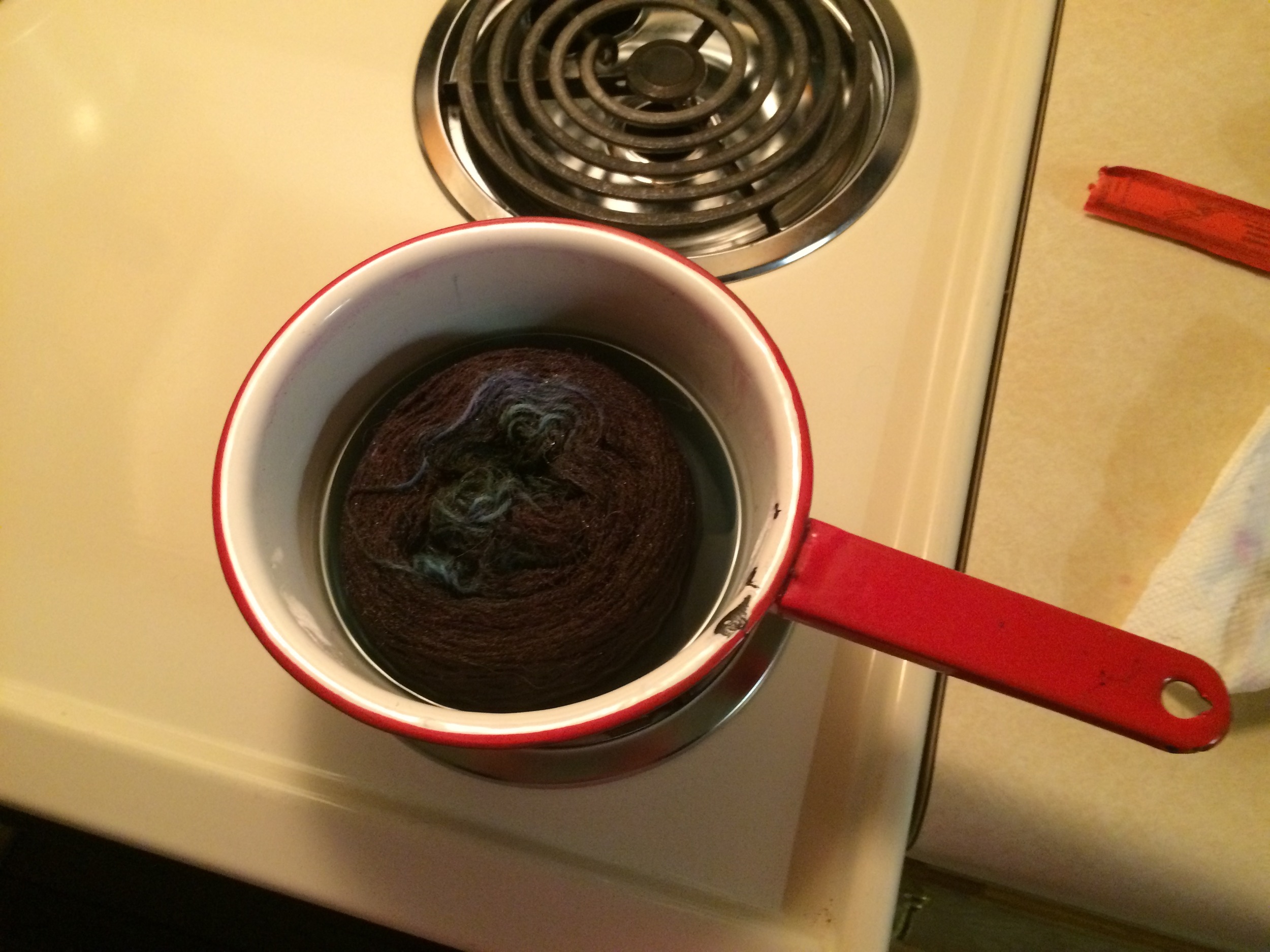 Cake of yarn in the dye pot.