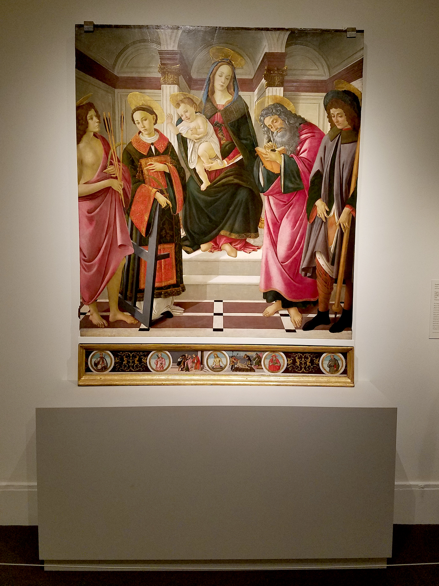 Virgin and Child Enthroned with Saints Sebastian, Lawrence, John the Evangelist and Roch (Altarpiece of Montelupo), 1499