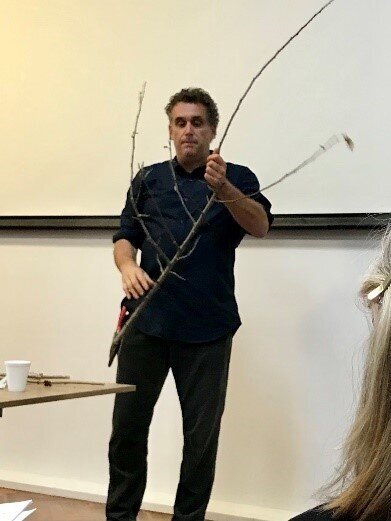 Jonathan demonstrates the pruning techniques for the Oak Leafed Hydrangea.