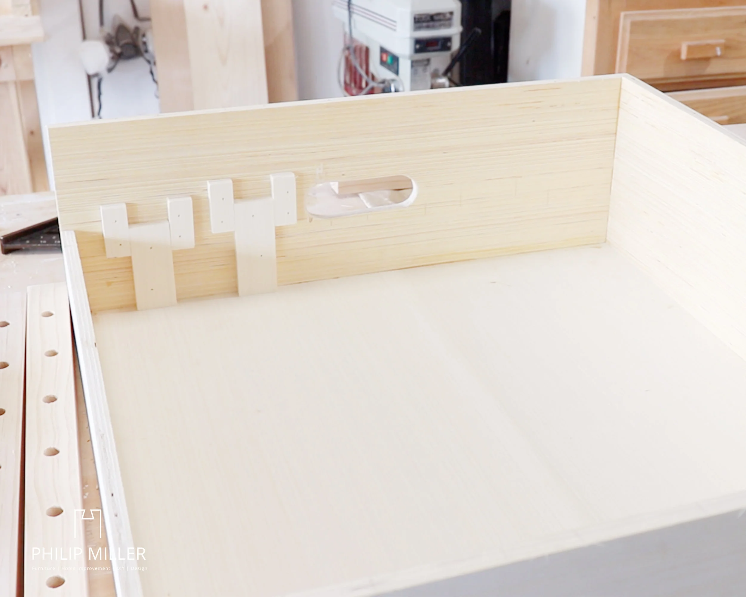 adding the supports to hold the ring toss rails in the ring toss box