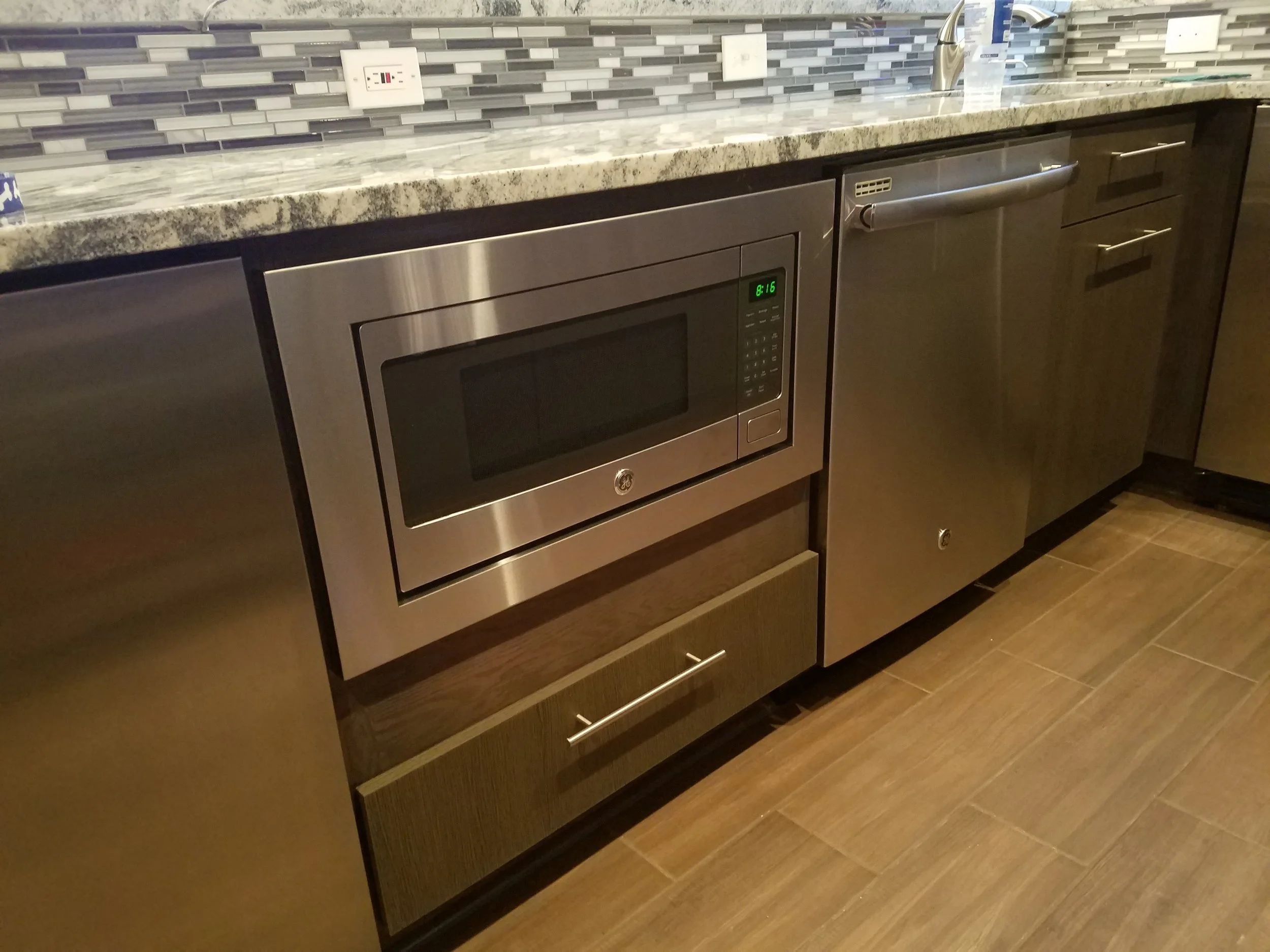 Custom trim kit for a GE microwave, model # PEM31SFSS
