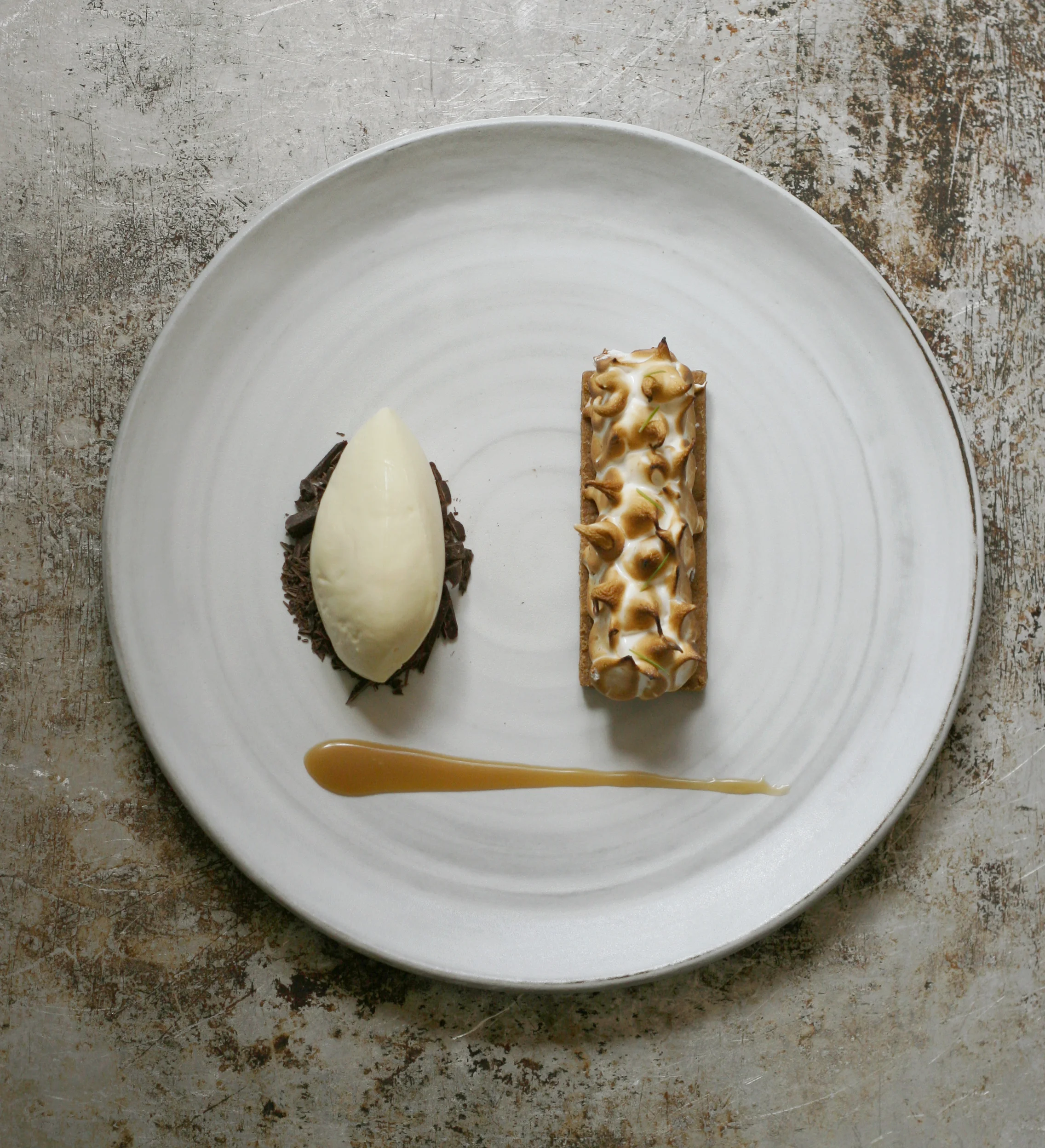  bittersweet chocolate Pavé, burnt marsala meringue, graham, smoked gelato (currently serve at Cafe Juanita) 