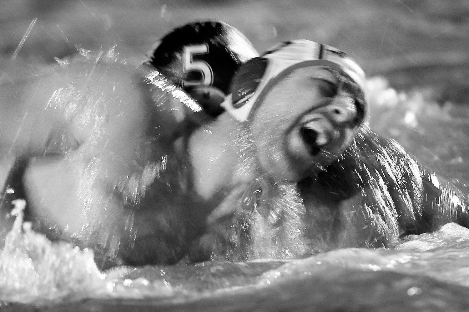 UWA Torpedoes Spanish import Alex Codina competes with Drummoyne Devils Milan Nesic in the National Water Polo League on Friday 27th March 2015 at Drummoyne Pool in Sydney, Australia