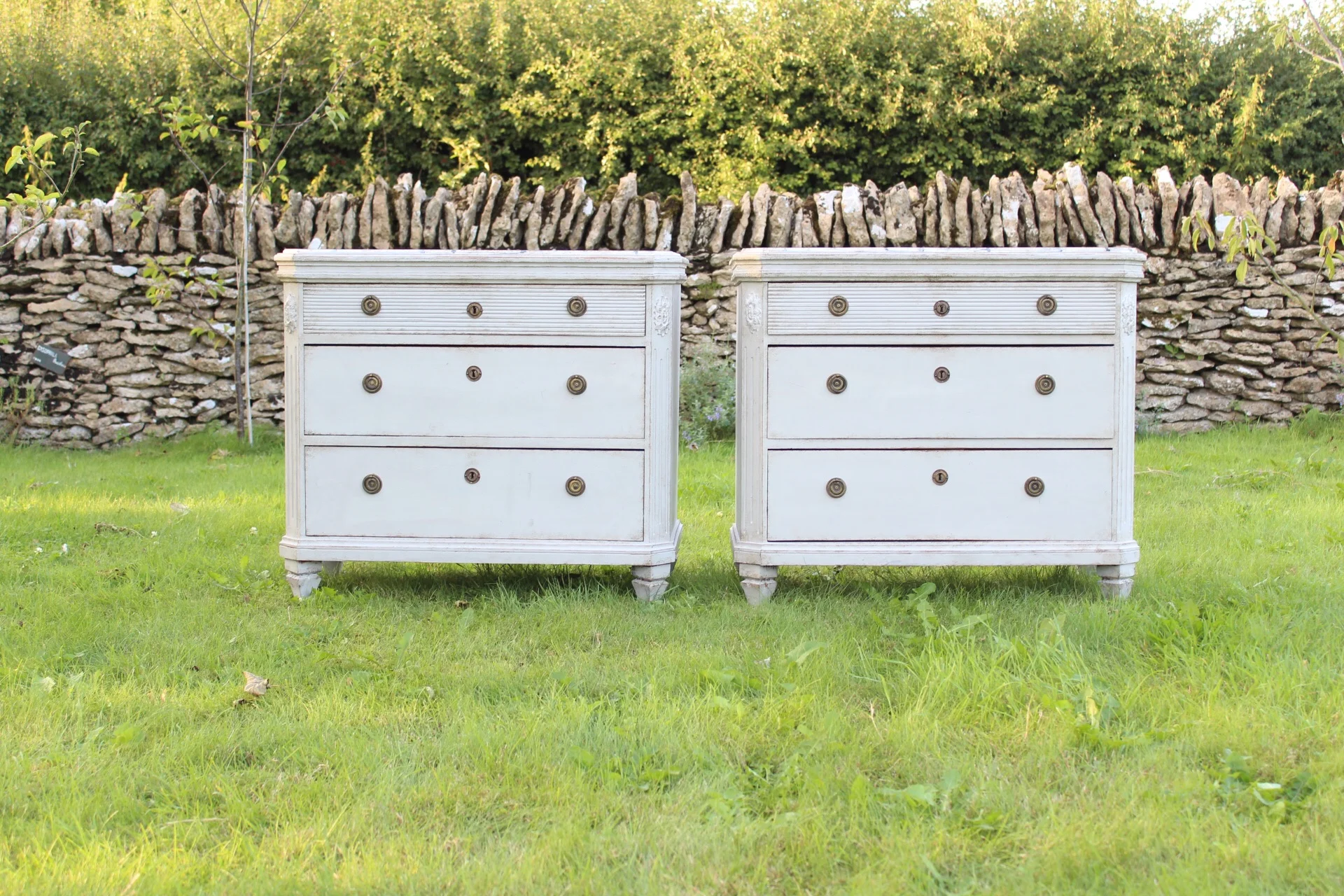 Beautiful pair , reeded top drawers and faux marble effect on the top