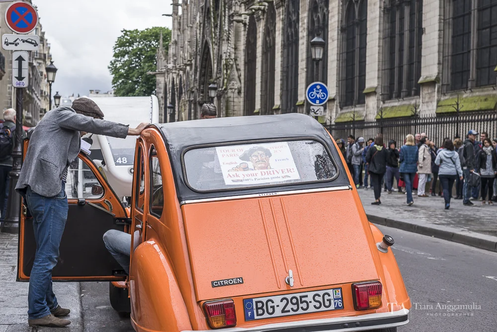 A parisian and his Citroen.